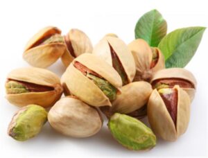 Pistachios on a white background | Oftalmoceuta - Centro de Ojos de Ceuta · Dr. Medín filename sep oftalmoceuta